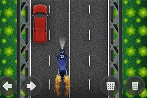 En motorsykkel i fart på en motorvei, sett ovenfra, med en rød bil foran og grønne områder på sidene