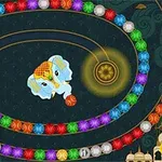 En elefantfigur sitter i midten omgitt av fargerike kuler arrangert i spiralmønstre