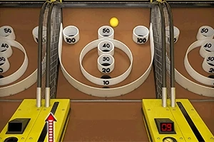 Ballen svever foran poengringer med forskjellige verdier i et klassisk kaste-ball-spill