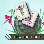 To mahjong-brikker med dekorative symboler over en dekorativ bakgrunn med blomster og teksten Mahjong Time nederst